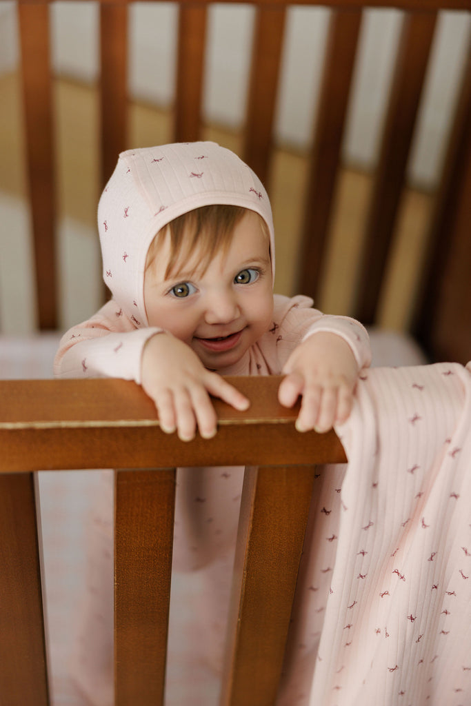 Aurora Bow Pattern Collection Footie And Bonnet - Pink